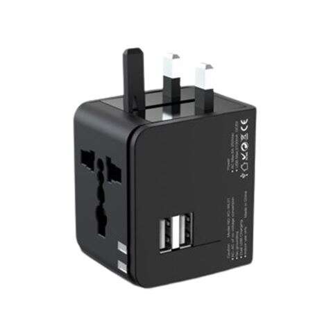 XO Adaptador de Viaje Universal - Voltaje 110V-240V - 2 Puertos USB 2.1Amp - Conexiones para UK, EU, AU, US - Color Negro 1 pieza(s)