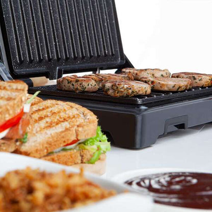 Orbegozo Grillgr 3250 - Grill Multifuncional con Placas Abatibles 180º y Recubrimiento Antiadherente - Potencia de 900W - Termostato Regulable y Bandeja Recoge Salsas 1 pieza(s)