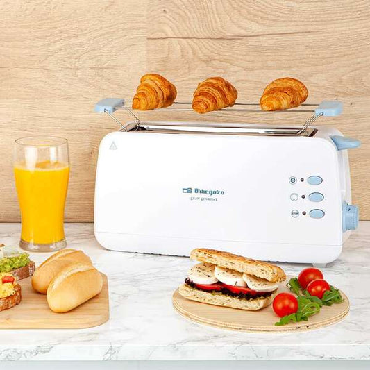 Orbegozo TO 4012 Tostadora de Ranura Larga Multifuncional - Potencia 850W - Termostato Regulable - Funcion Descongelacion y Recalentamiento - Bandeja Recogemigas - Almacenamiento Comodo 1 pieza(s)